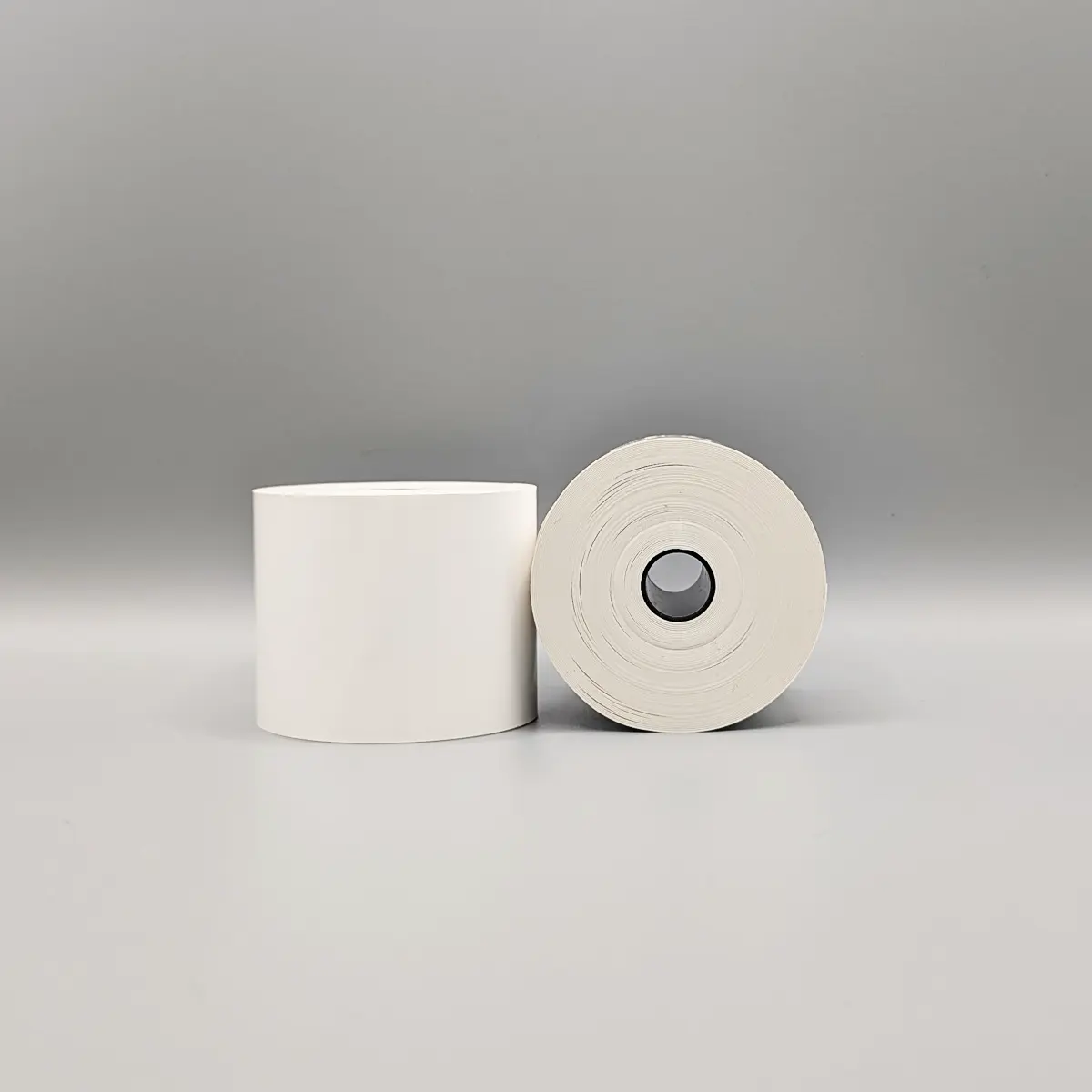 Linerless-Etikett 50mm x 31m mit 12mm Kern und 60mm Durchmesser,  Stapel